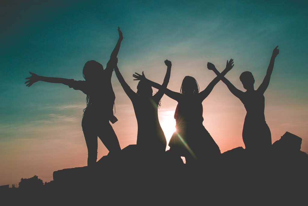 silhouette of women in the sunrise
