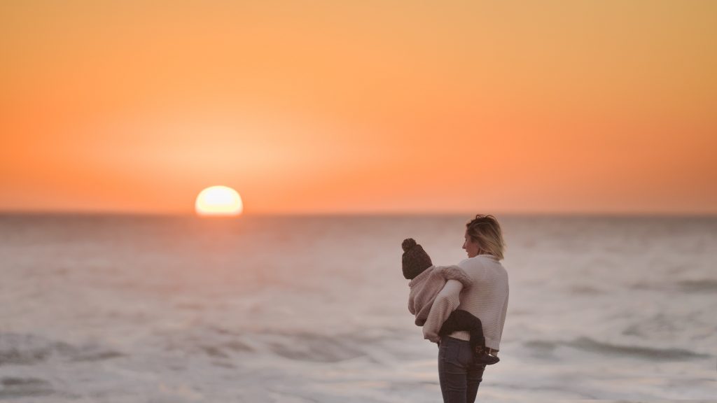 mother and child in sunset